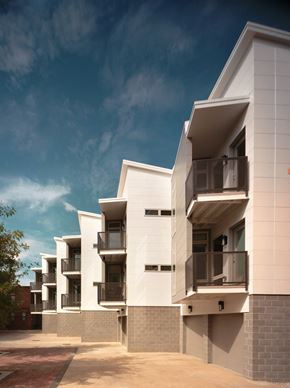 Cleveland apartment for rent - a rendering of a white apartment building with balconies