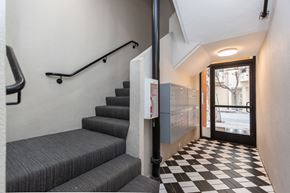 San Francisco apartment for rent - A staircase with a black and white checkered floor.