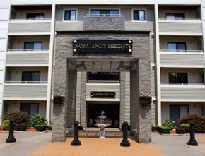 New Britain apartment for rent - a building with a fountain in front of it