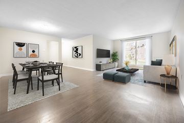 London apartment for rent - A modern living room with a dining table and chairs.