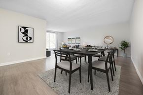 London apartment for rent - A dining room with a table set for six.