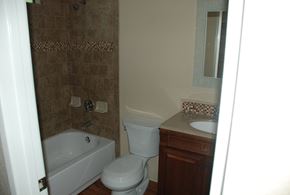 San Diego apartment for rent - a bathroom with a tub toilet and sink