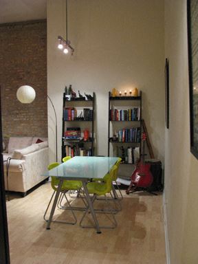 Chicago apartment for rent - a dining room with a table and chairs