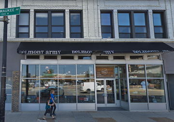 Chicago apartment for rent - A woman walks past a Belmont Army storefront.