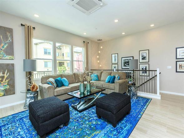 Oxnard townhouse for rent - a living room with a couch and a table