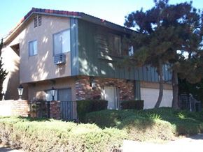 Whittier apartment for rent - A house with a green roof and a grey door.