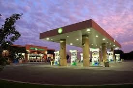 Cottage Grove apartment for rent - a gas station at night with a purple sky