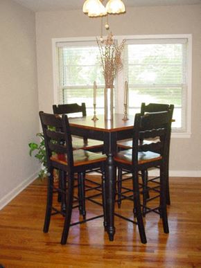 Tulsa apartment for rent - a dining room table with chairs and a window