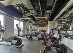 Hoboken apartment for rent - A gym with a row of stationary bikes.