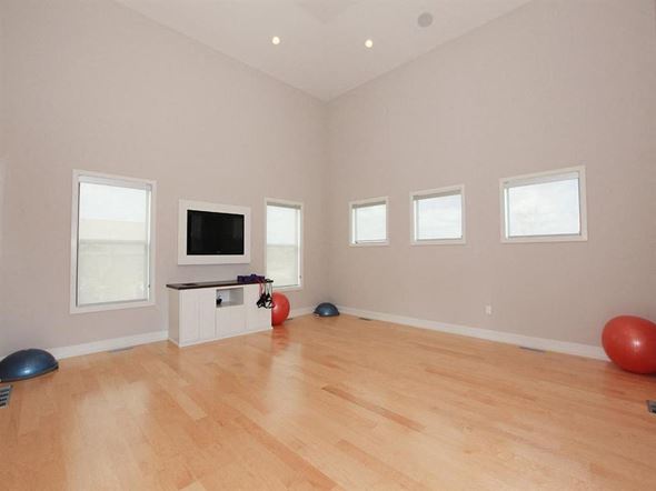 Lenexa apartment for rent - a living room with a tv and a hard wood floor