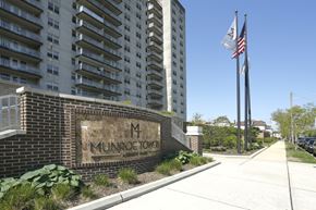 Asbury Park apartment for rent - A brick building with a sign that says Munroe Tower.