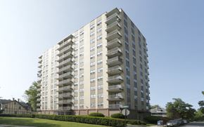 Trenton apartment for rent - A tall residential building with balconies on each floor.