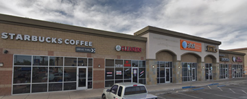 Las Vegas apartment for rent - the exterior of a starbucks coffee store in a parking lot