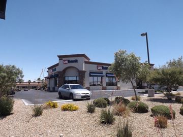 Las Vegas apartment for rent - A US Bank branch is located in a parking lot with a car parked in front.