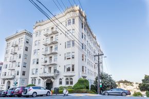 San Francisco apartment for rent - A large white building with a balcony on the second floor.