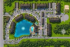 Bradenton apartment for rent - a birds eye view of a resort with a large pool