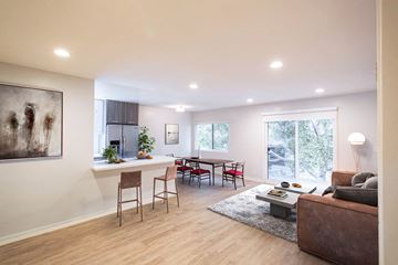 Los Angeles apartment for rent - the living room and dining room of a home with a table and chairs