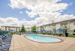Toledo townhouse for rent - our apartments have a pool and lounge chairs