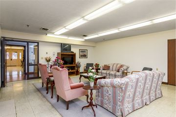 Canton apartment for rent - a living room with couches and chairs and a table