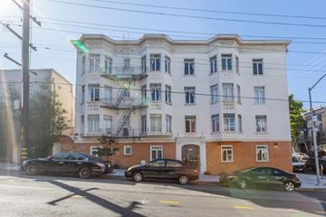 San Francisco apartment for rent - A black car is parked on the side of the street.
