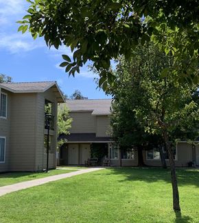 Penn Valley townhouse for rent - exterior building with landscape and grass area at COURTYARDS @ PENN VALLEY, PENN VALLEY