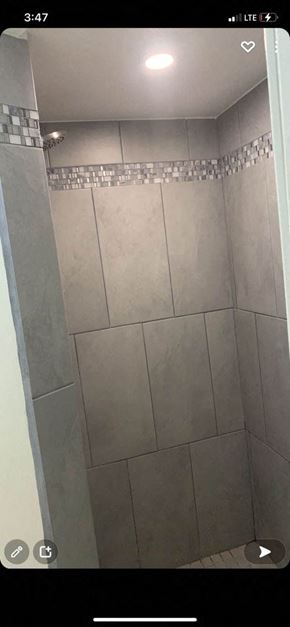 Tucson apartment for rent - a bathroom with a tiled floor and a shower
