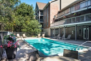 Two outdoor swimming pools with sundecks