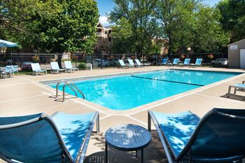 Outdoor heated swimming pool with sundeck