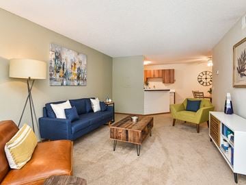 St. Louis Park apartment for rent - a living room with a couch and a coffee table