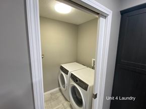 Brandon apartment for rent - a laundry room with a washer and a dryer in it