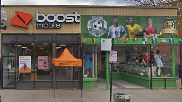 Chicago apartment for rent - A storefront with a large mural of soccer players and the text "Chicago Celtic" on the wall.