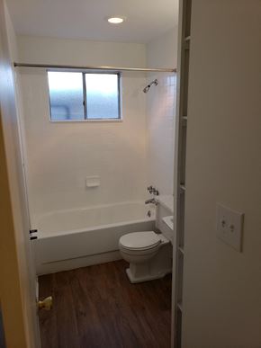 Colorado Springs apartment for rent - a small bathroom with a toilet and a window