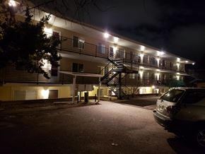 Colorado Springs apartment for rent - the building where the motel is located is lit up at night