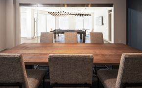 Omaha apartment for rent - a dining room with a wooden table and chairs