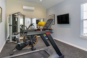 Whitehouse Station apartment for rent - a home gym with exercise equipment and a tv