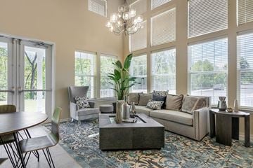 Whitehouse Station apartment for rent - a living room with large windows and a rug