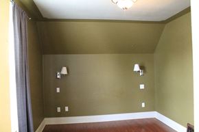 Brandon apartment for rent - an empty room with green walls and white lamps