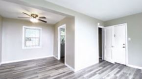San Francisco apartment for rent - an empty living room with a ceiling fan
