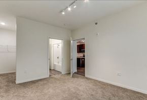Grand Forks apartment for rent - a bedroom with a closet and a door to a bathroom