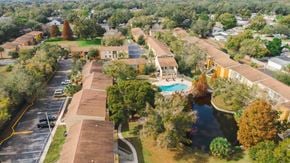 Tampa apartment for rent - A view of a school from above with a pool in the middle.