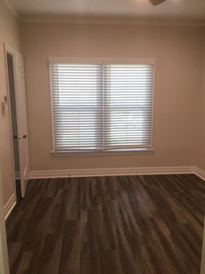 Glendale apartment for rent - a living room with wooden floors and a window with blinds