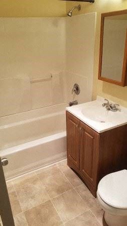 San Diego apartment for rent - a bathroom with a toilet and a sink and a bath tub