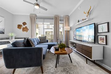 Scottsdale townhouse for rent - a living room with a couch and a tv