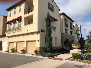 Camarillo apartment for rent - a street view of a building with garages