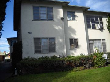 Sherman Oaks apartment for rent - A white two-story building with the number 4535 on the front.