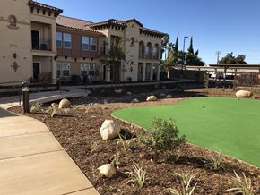 Yucaipa apartment for rent - a golf course in front of a building
