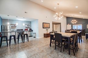 Maumelle apartment for rent - a kitchen and dining room with a table and chairs
