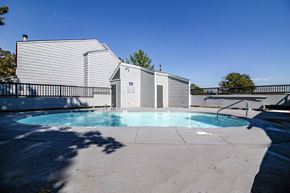Sherwood condo for rent - a swimming pool with a building in the background