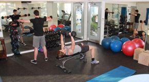 Davis apartment for rent - a group of people working out in a gym