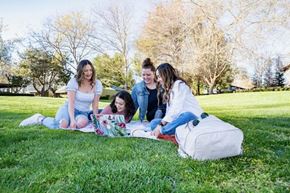 Davis apartment for rent - Residents sit on the grass area at Chautauqua